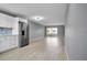 The living room has an open floor plan and sliding glass doors to the balcony at 2901 N Halifax Ave # 220, Daytona Beach, FL 32118