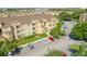 Aerial view of a condo complex with ample parking, showcasing the convenient location at 305 Terrace Ridge Cir # 305, Davenport, FL 33896