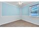 Bedroom with a light blue paint, and wood-style tile flooring at 344 Highland Meadows St, Davenport, FL 33837