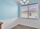 The dining room has tile floors and a large window that allows natural light into the area at 344 Highland Meadows St, Davenport, FL 33837
