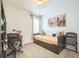 Bright bedroom featuring neutral carpet, a ceiling fan, and soft, natural lighting at 3679 Julius Estates Blvd, Winter Haven, FL 33881