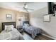 Bright bedroom with two twin beds, stylish decor and natural light, creates a relaxing space at 4504 Alberto Cir, Kissimmee, FL 34746