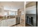 Kitchen with granite countertops, stainless steel appliances, and easy access to living area at 4504 Alberto Cir, Kissimmee, FL 34746