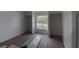 Bedroom with fresh paint and natural light coming from the window at 459 Danube Dr, Poinciana, FL 34759