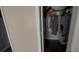 Walk-in closet with hanging clothes on the rod at 459 Danube Dr, Poinciana, FL 34759