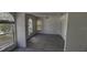 Spacious living room with new floors, fresh paint, and lots of natural light at 459 Danube Dr, Poinciana, FL 34759