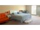 Bright bedroom features neutral walls, a king bed and decor at 461 Fish Hawk Dr, Winter Haven, FL 33884