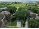 Gorgeous home with mature trees and landscaping in a desirable neighborhood near the water and golf course at 6084 Masters Blvd, Orlando, FL 32819