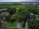 Gorgeous home with mature trees and landscaping in a desirable neighborhood near the water and golf course at 6084 Masters Blvd, Orlando, FL 32819