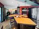 Bright, airy kitchen featuring stainless steel appliances, a breakfast bar, and open access to living spaces at 6084 Masters Blvd, Orlando, FL 32819