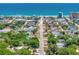 An aerial view of a neighborhood street, leading directly to the ocean at 804 E 24Th Ave, New Smyrna Beach, FL 32169
