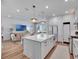 Spacious open-concept kitchen with a large island and seamless connection to the living area at 804 E 24Th Ave, New Smyrna Beach, FL 32169