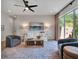 Bright living room showcases contemporary furniture, rug, and decor near sliding glass door at 804 E 24Th Ave, New Smyrna Beach, FL 32169