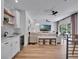 Open floor plan with a bar area, living room, flat screen TV and glass doors to the outside at 804 E 24Th Ave, New Smyrna Beach, FL 32169