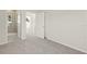 Bedroom with carpet floors and view of the bathroom at 805 S Locust Ave, Sanford, FL 32771