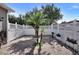 Private paver backyard features white fence and manicured foliage at 8111 Pacific Loon St, Winter Garden, FL 34787