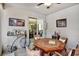 Game room with full bar, game table, and sliding door to the outside at 8111 Pacific Loon St, Winter Garden, FL 34787