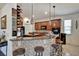 Charming kitchen features a stylish breakfast bar, stainless steel appliances, and ample cabinet space at 8111 Pacific Loon St, Winter Garden, FL 34787
