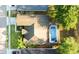 Birds-eye view of the house with pool, roof and lawn at 847 Coventry Rd, Davenport, FL 33897