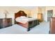 Comfortable bedroom features a sizable bed and furniture at 847 Coventry Rd, Davenport, FL 33897