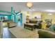 Bright, open living room with modern tile floors and an inviting layout at 847 Coventry Rd, Davenport, FL 33897