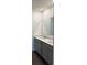 Modern bathroom with double vanity sinks and stylish cabinets at 978 Commons Way, Port Orange, FL 32129