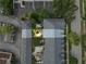 Aerial view showcasing the community layout with landscaping, parking, and an outdoor space at 984 Fern Ave, Orlando, FL 32814