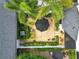 An aerial view of the backyard featuring a patio with outdoor seating and trimmed bushes at 984 Fern Ave, Orlando, FL 32814