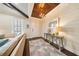Bright foyer boasts stylish decor, wood-look floors, shiplap walls, and a decorative ceiling at 984 Fern Ave, Orlando, FL 32814