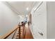 Upstairs hallway with wood flooring, recessed lighting, with views to an office and bathroom at 984 Fern Ave, Orlando, FL 32814