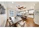 Open concept kitchen with a center island and dining table with lots of natural light at 984 Fern Ave, Orlando, FL 32814