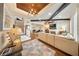 Spacious living room with beamed ceilings, shiplap walls, fireplace, and wood floors at 984 Fern Ave, Orlando, FL 32814