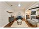 Comfortable sitting area with modern furnishings, wood floors, and a decorative mirror at 984 Fern Ave, Orlando, FL 32814
