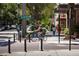 Street view of New Broad Street with pedestrian and cyclist in a walkable community setting at 984 Fern Ave, Orlando, FL 32814
