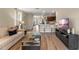 Inviting living room with a large sectional sofa, sleek coffee table, and an open layout at 989 Commons Way, Port Orange, FL 32129