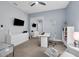 Office space with neutral walls, carpet flooring, white desk, and mirrored closet at 16238 Misty Hills Ave, Winter Garden, FL 34787