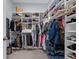 Spacious walk-in closet equipped with ample shelving and hanging space for organized storage at 16238 Misty Hills Ave, Winter Garden, FL 34787