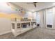 Themed ' bedroom with bunk beds, ceiling fan and custom painted mural at 1014 Jack Nicklaus Ct, Reunion, FL 34747