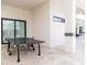 Spacious patio with ping pong table perfect for outdoor recreation at 1014 Jack Nicklaus Ct, Reunion, FL 34747