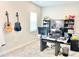 Functional home office with built-in shelves, a modern desk, and lots of decor at 10275 Park Estates Ave, Orlando, FL 32836