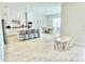 Spacious open floorplan integrating kitchen, dining, and play areas for versatile living at 10275 Park Estates Ave, Orlando, FL 32836