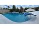 Backyard pool with an attached spa, and a large patio area for summer relaxation at 10275 Park Estates Ave, Orlando, FL 32836