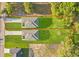 Aerial view of new construction homes on expansive lots with manicured lawns at 104 Alta Vista Way, Davenport, FL 33837