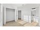 Bright bedroom showcases natural light, a walk-in closet, and an ensuite bathroom at 104 Alta Vista Way, Davenport, FL 33837