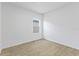 Light and airy bedroom boasts a window and neutral color palette at 104 Alta Vista Way, Davenport, FL 33837