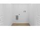 Dedicated laundry hookup space with wire shelving in closet at 104 Alta Vista Way, Davenport, FL 33837