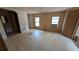 Spacious bedroom featuring dual windows, vintage wallpaper, and generous natural light at 1275 Arapaho Trl, Geneva, FL 32732