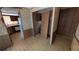 Bedroom showing a closet and access to the kitchen at 1275 Arapaho Trl, Geneva, FL 32732