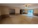 Spacious living room featuring sliding glass doors and a ceiling fan at 1275 Arapaho Trl, Geneva, FL 32732