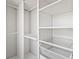 Organized closet with built-in shelving, rods, and wire baskets at 13242 Orange Isle Dr, Windermere, FL 34786